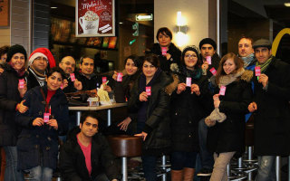 Mahzad Sharifahmadian (third from right) and the group of volunteers gathered for a group picture after the event, Montreal, Canada