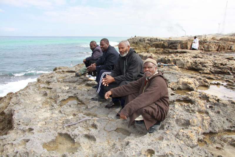 A group of Tawerghan men displaced after the fighting in Libya in 2011. UNHCR is concerned about the situation of some 2,500 Tawerghans who fled their camp in Benghazi in mid-October to escape fighting that has forced more than 100,000 to flee their homes in the past month. © UNHCR/ L. Dobbs