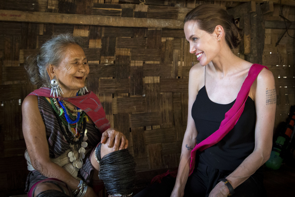 UNHCR Special Envoy Angelina Jolie visits ethnic Karenni refugee Baw Meh, age 75, and her family from Myanmar, in Ban Mai Nai Soi refugee camp. The camp is located approximately 2km from the Thai-Myanmar border. @ UNHCR / R. Arnold