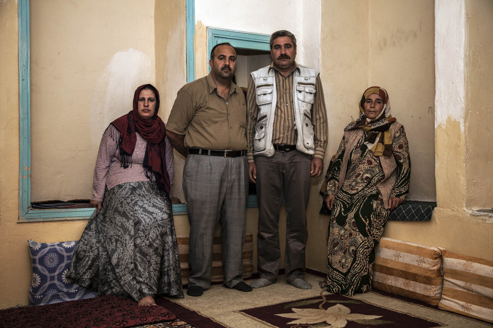 Songul and Veysi (left) found refuge in Turkey with his nephew Ibrahim, a bread maker, and his wife, Feyime. 