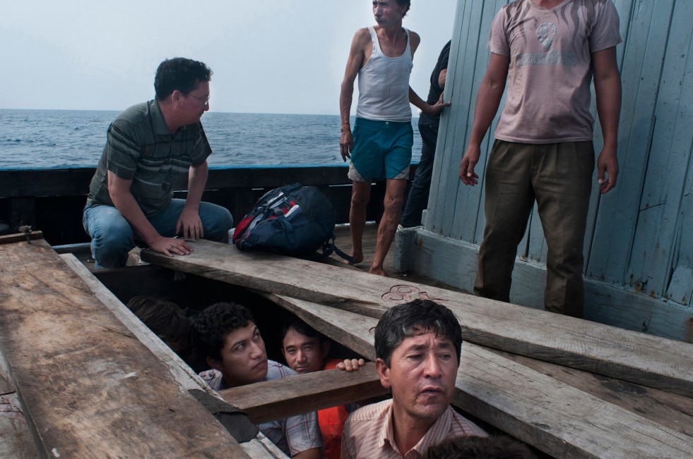 On the first day at sea, Batoor hid below deck with 92 other passengers so as not to be seen by the water police. They took turns coming up for fresh air. 