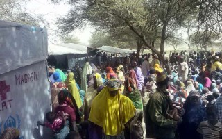 Nigerian refugees wait to be registered by UNHCR in Ngouboua, western Chad.