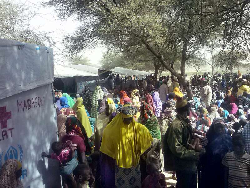 Nigerian refugees wait to be registered by UNHCR in Ngouboua, western Chad.