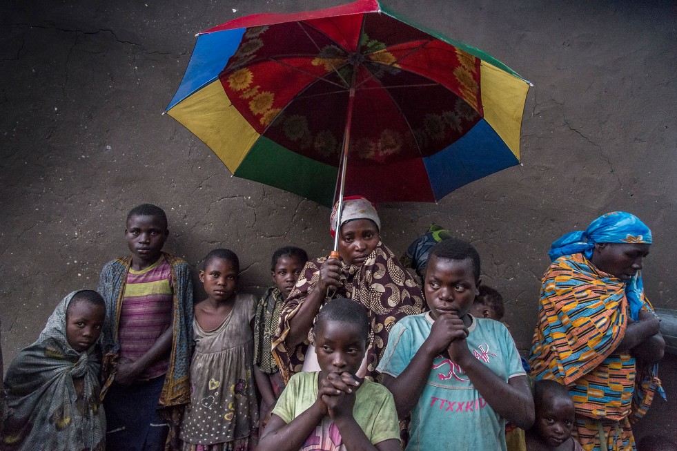 After their shelters in Kiwanja settlement were razed last month, displaced families had to contend with heavy rain.