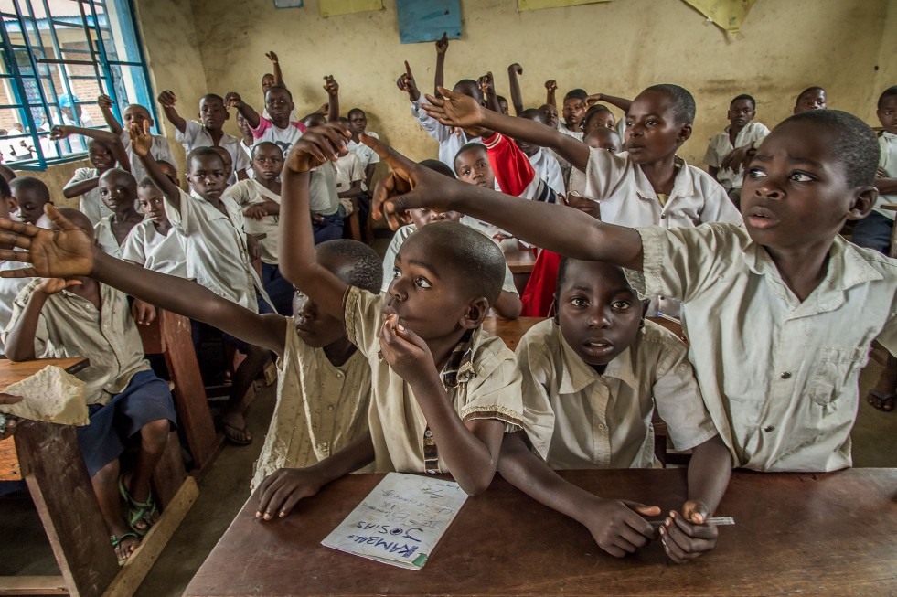 Some parents evicted from the settlement do not want to withdraw their children from the local school in Rutshuru. In this classroom, a third of the students are from displaced families.