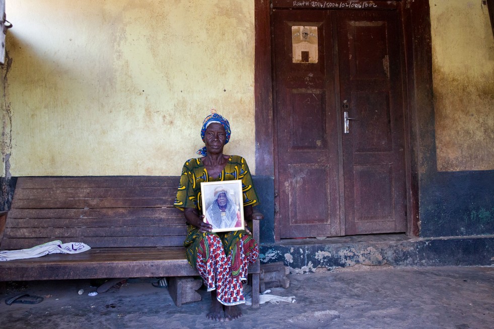 Nana, 79, was stateless for decades after moving to what is now Côte d’Ivoire in the 1940s but recently acquired a consular card from Burkina Faso. She holds a photo of her late husband.
