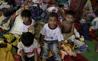 Indonesian fishermen have rescued hundreds of Bangladeshis and Rohingya from Myanmar this month, including these children.