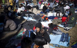 People relaxing at the Croatian government transit center in Opatovac, near the Serbian border.