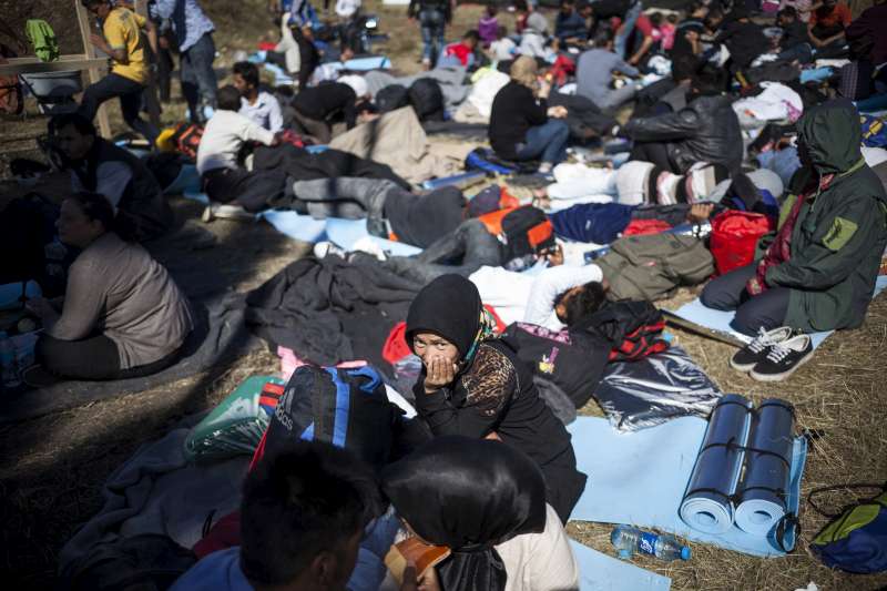 People relaxing at the Croatian government transit center in Opatovac, near the Serbian border.