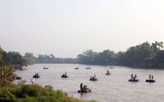 Rafts cross the Suchiate river that divides Guatemala from Mexico, in Chiapas, Mexico. The Suchiate river is one of the main entry points for many Central American migrants that are escaping violence in their countries.