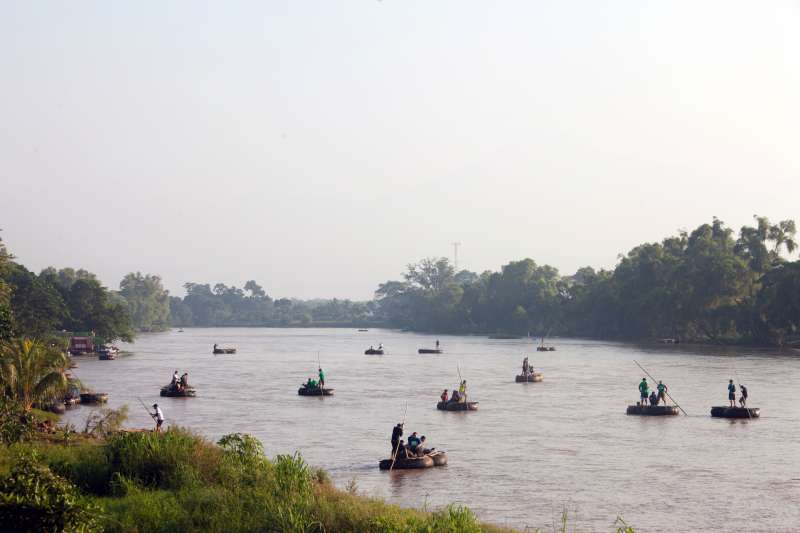 Rafts cross the Suchiate river that divides Guatemala from Mexico, in Chiapas, Mexico. The Suchiate river is one of the main entry points for many Central American migrants that are escaping violence in their countries.