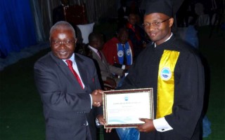 Burundian refugee, Olivet Nayankuru, receives his university degree from Mozambican president, Armando Guebuza last summer. Traditionally the President of Mozambique personally hands the diploma to the best preforming student in the entire university.