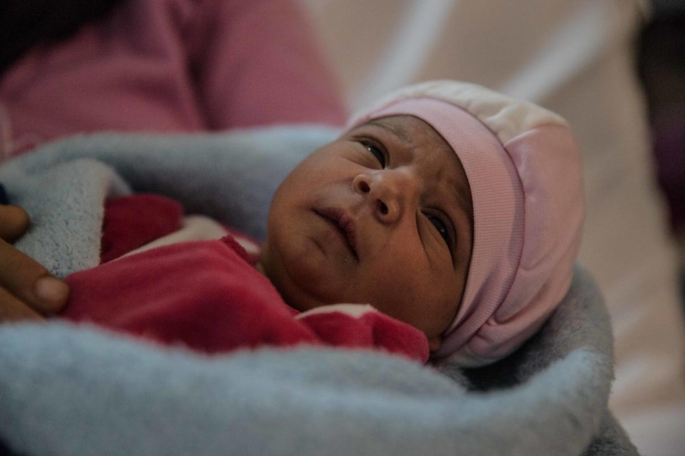  Samar was born just hours after her mother landed in Lesvos, after crossing the narrow stretch of sea between Turkey and Greece. UNHCR/Hereward Holland