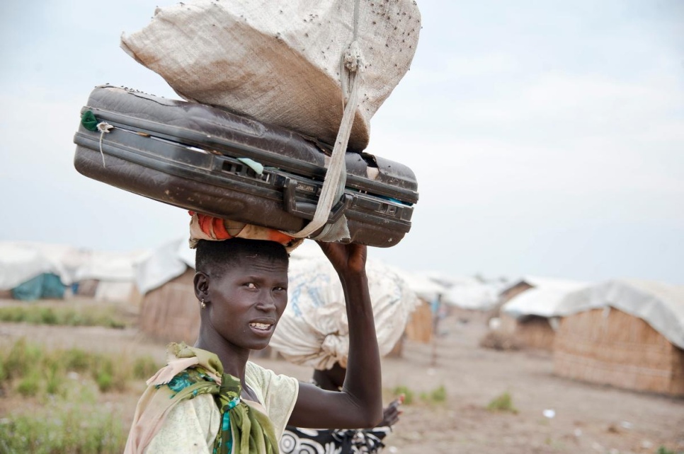 Nyakong, 22, fled fighting in South Sudan in 2014 and crossed the border to Ethiopia. “I left my children at home so that I could search for food,” she says. “They can’t walk here as the area is full of water and I can’t afford the boat.” © UNHCR/Catianne Tijerina