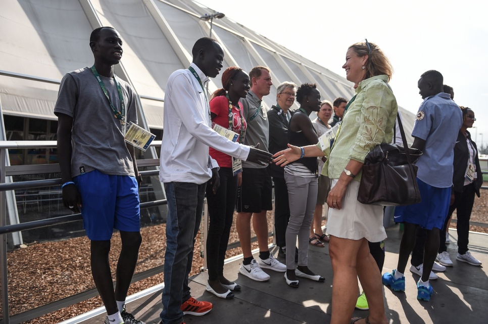 Members of the Refugee Olympics Team meet UN Deputy High Commissioner for Refugees Kelly Clements in Rio’s Olympic Village. © UNHCR/Benjamin Loyseau
