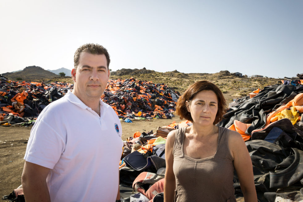 This vast pile of lifejackets in northern Lesvos, ten acres wide and five metres high, is a haunting reminder of the dangers faced by refugees who arrived on Greek shores in 2015. Many of these jackets are fake, filled with Styrofoam or plastic. This place symbolizes the hopes and dreams of people, the fear, and the dangerous journey they made to get here, says Efi Latsoudi, a human rights activist who runs "PIKPA village" on Lesvos. Now that I see these lifejackets fading, I hope that the memory of what happened here will not fade away. Konstantinos Mitragas, whose Hellenic Rescue Team (HRT) spent much of 2015 rescuing refugees from Greek and Turkish waters, says 2015 is a year neither of them will ever forget. I think we both hope that we will never live that again. This is something well carry with us for the rest of our lives. ; Efi Latsoudi, a human rights activist behind "PIKPA village" on the Greek island of Lesvos, and Konstantinos Mitragas on behalf of the Hellenic Rescue Team are joint winners of UNHCRs Nansen Award 2016. The award recognizes their tireless efforts to aid refugee arrivals in Greece during 2015. Greece has been at the center of Europes escalating refugee crisis since 2012. On the island of Lesvos alone, record numbers of refugees and migrants arrived last year, as conflicts in Syria, Afghanistan and Iraq continued to uproot people from their homes. Other Greek islands, including Samos and Kos, also became safe havens, with thousands of people taking to unseaworthy boats to cross the Aegean Sea from Turkey. For many, the heroic humanitarian efforts of Latsoudi and Mitragas turned out to be the difference between life and death.