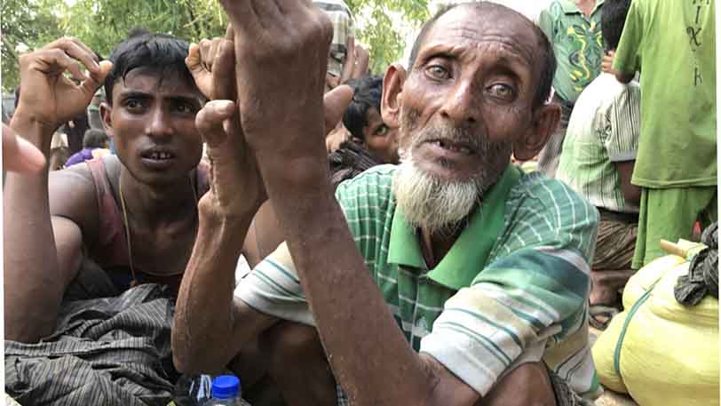 Mohammed Ismail, 65, arrived with his family of 12 from Buthidaung, Myanmar. He said men in uniforms went to his village every day to tell them to leave or they would be killed. © UNHCR/Vivian Tan