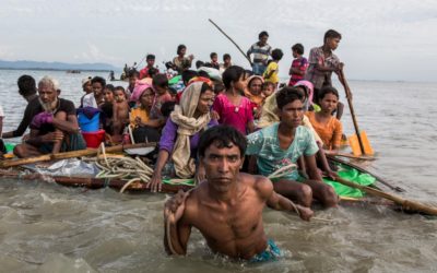 Desperate Rohingyas flee to Bangladesh on flimsy rafts