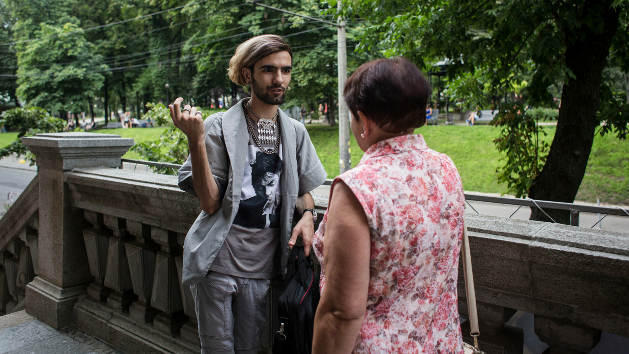 Oleg, an internally displaced gay 22-year-old drama student from Donetsk, talks to a curator at the Museum of Western and Oriental in Kyiv. After growing up victimised by harassment and bullying, he fled to Kyiv in the summer of 2014 as fighting got closer to his home. UNHCR/Anastasia Vladsova