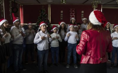 Deaf refugee choir warms hearts at Christmas