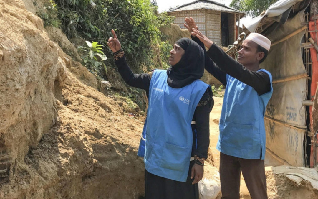 Rohingya refugee volunteers work to avert monsoon damage in Bangladesh