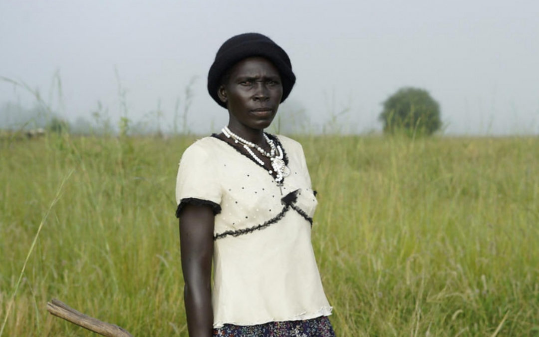 South Sudanese grow rice, and community ties, in Uganda