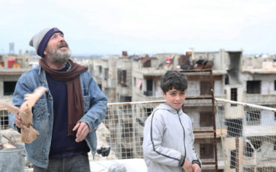 Syrian family embrace their homing instinct