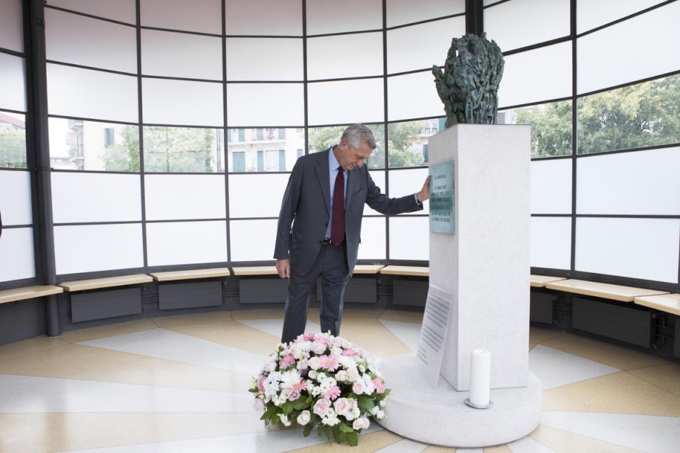 UN High Commissioner for Refugees, Filippo Grandi, touches a monument while pays respects to Humanitarians for World Humanitarian Day