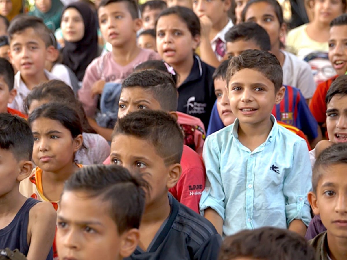 Derelict school in Lebanon gets new life as play centre for Syrian kids