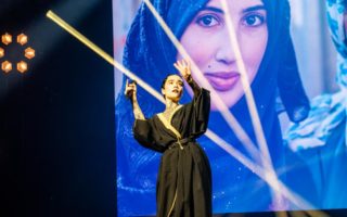 At the Nansen Refugee Award Ceremony, a woman sings