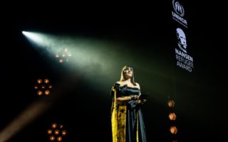 At the Nansen Refugee Award Ceremony, a woman presents an award