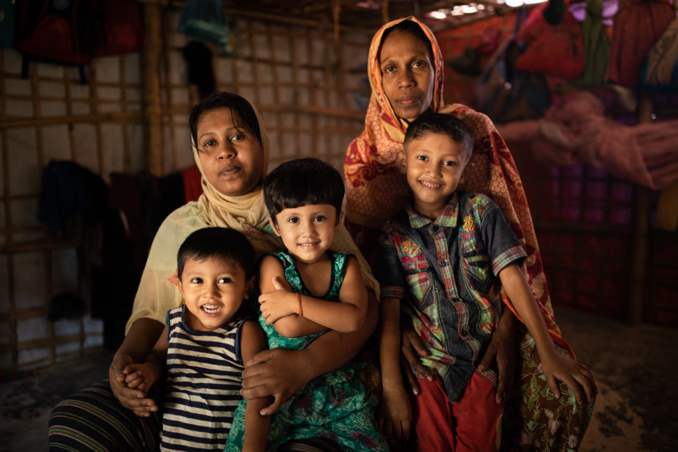 Rohingya family poses for a protrait