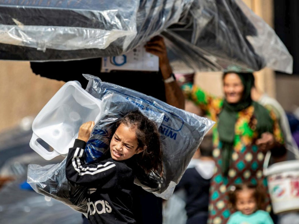 A girl from Syria flees her home