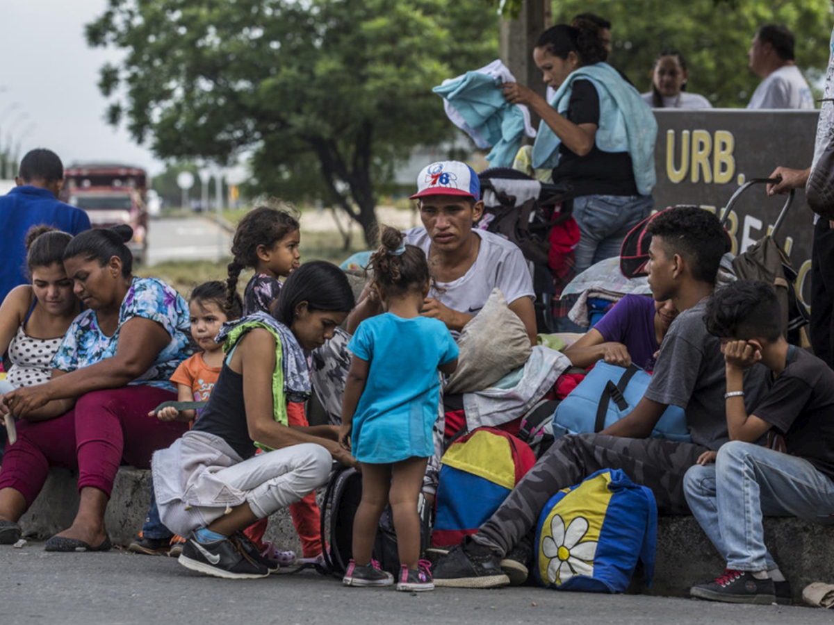 People from Venezuela sit and rest