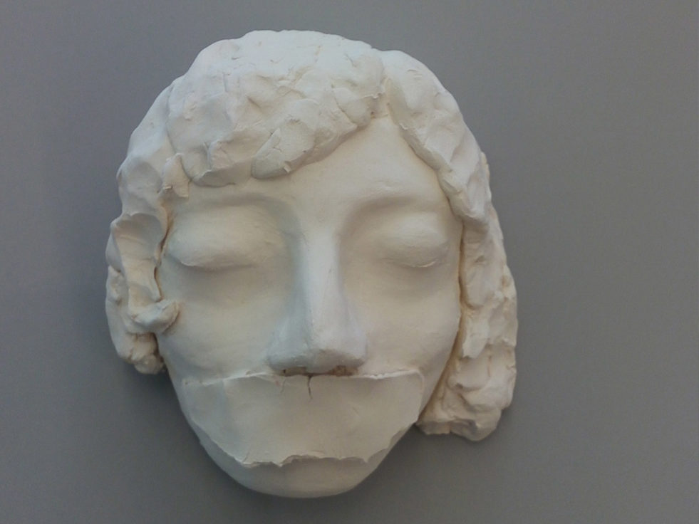 A sculpture of a woman with a taped mouth used as a cover for statelessness study