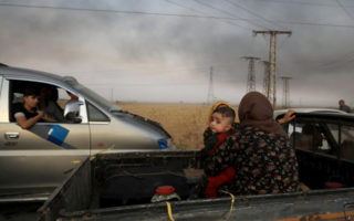 A family in Syria flees