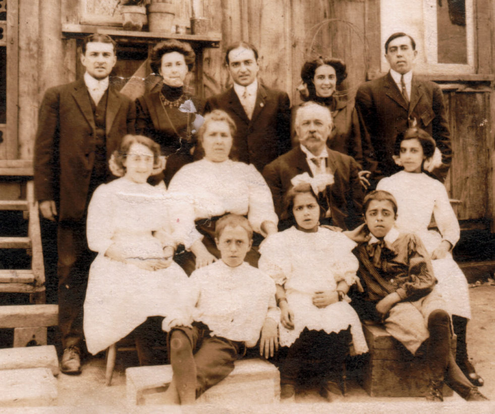 A sepia family portrait of a family in Canada