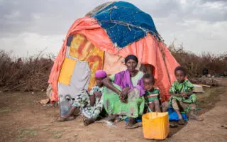 A family outside a tent