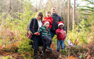British Columbia family with refugee in forest