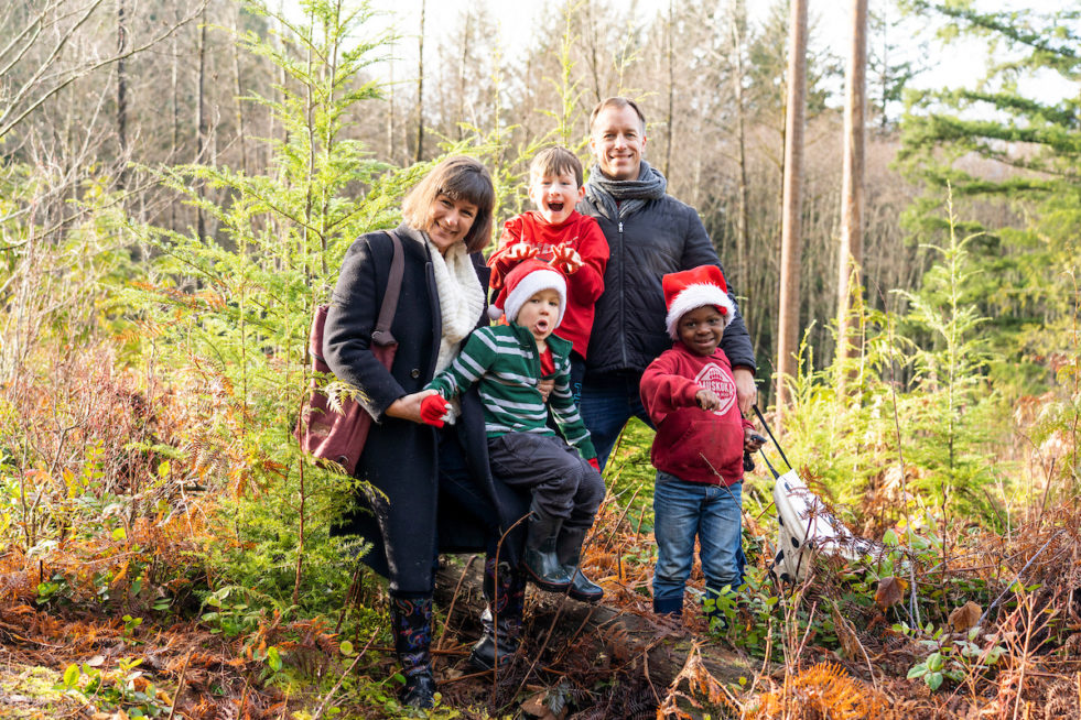 British Columbia family with refugee in forest