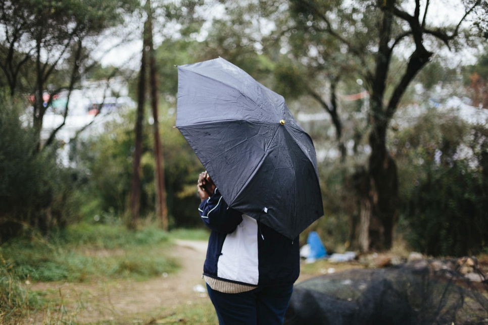 A person holding an umbrella