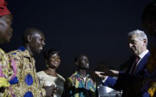 UN High Commissioner for Refugees Filippo Grandi (right) listens to returning refugees in the Central African Republic