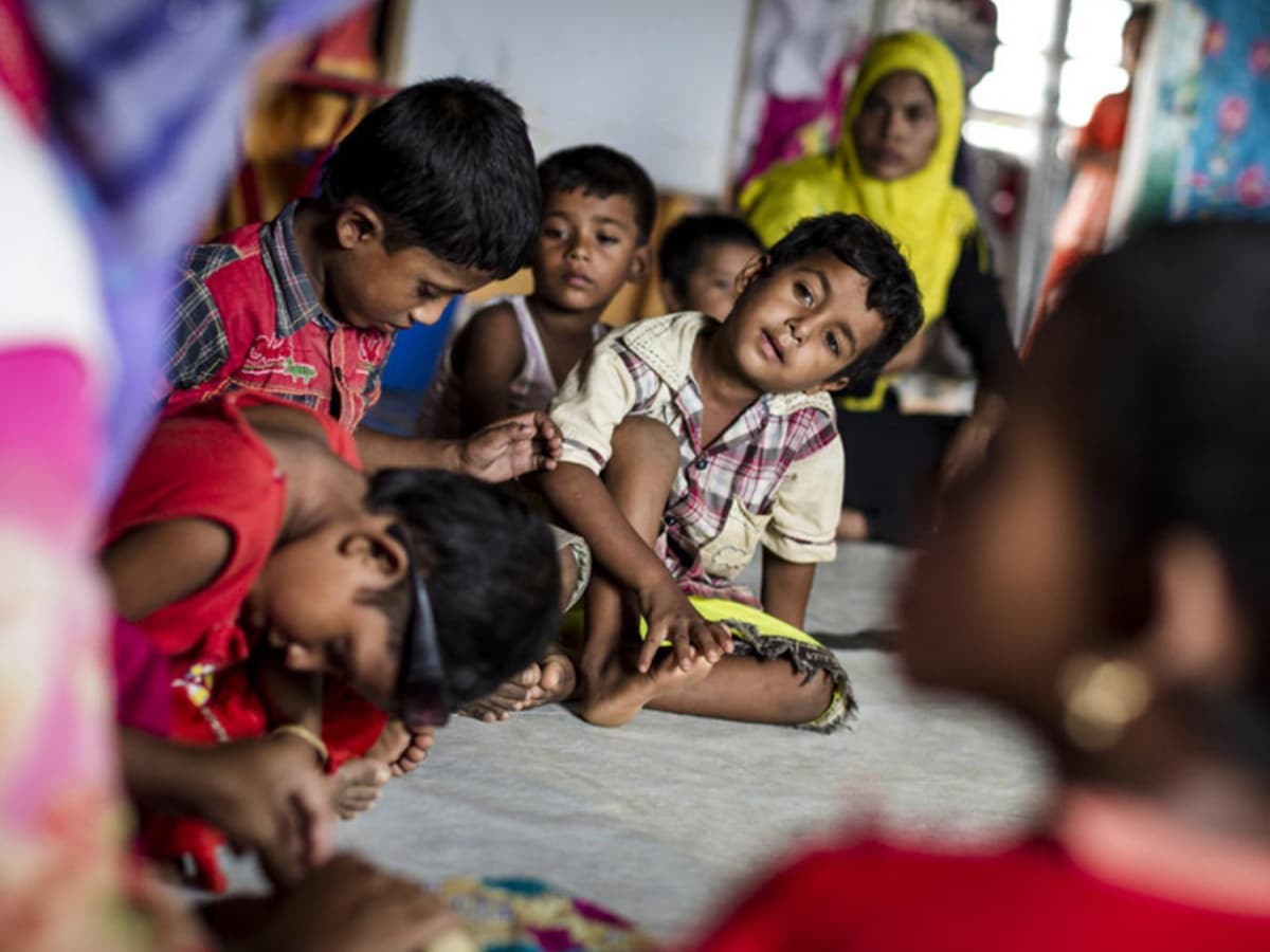 Rohingya children, who are at risk of abduction by human traffickers, play
