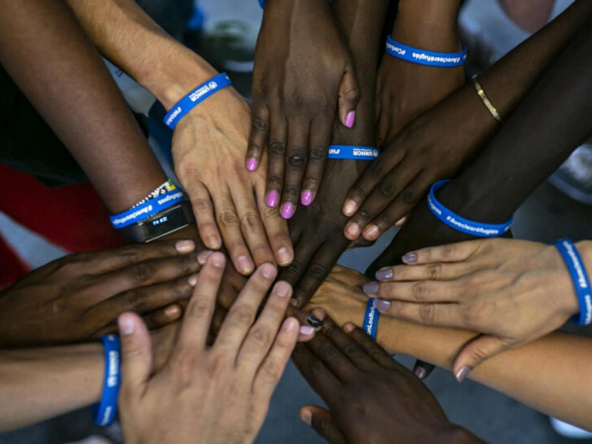 Hands coming together