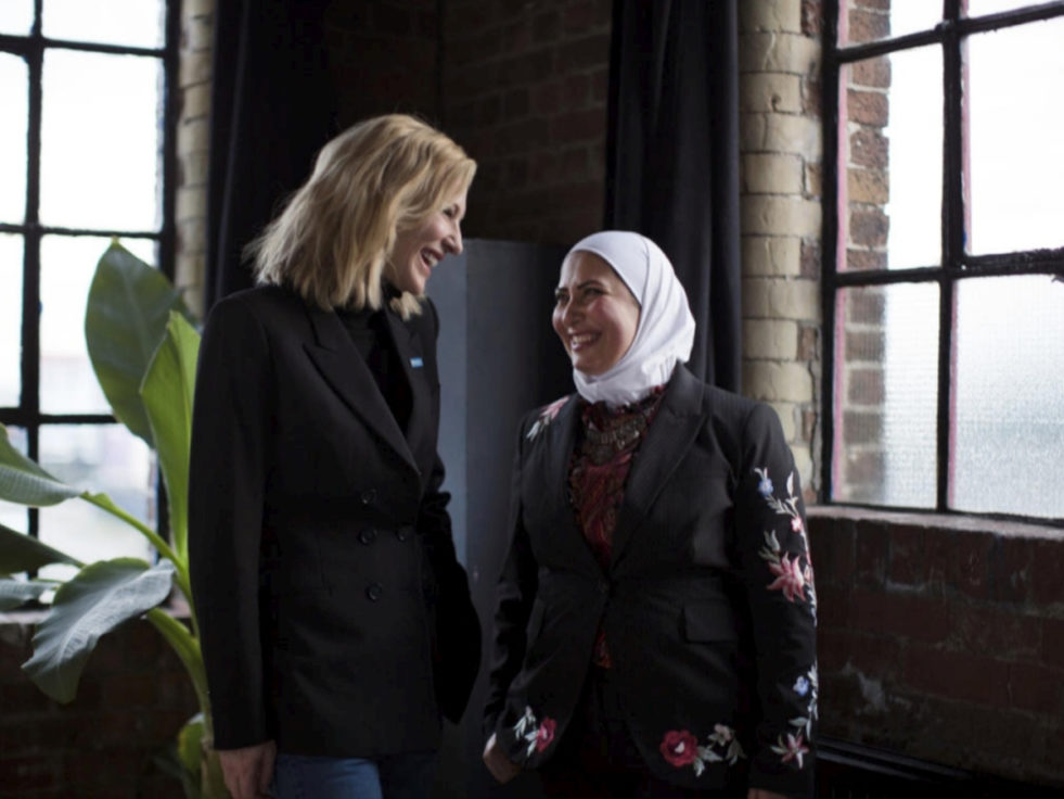 Cate Blanchett speaking with Syrian refugee