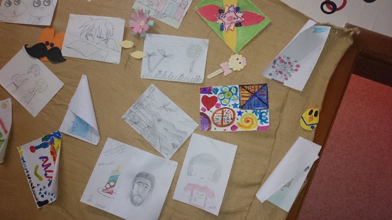 Drawings and art created by Syrian children who completed art therapy with Abrar