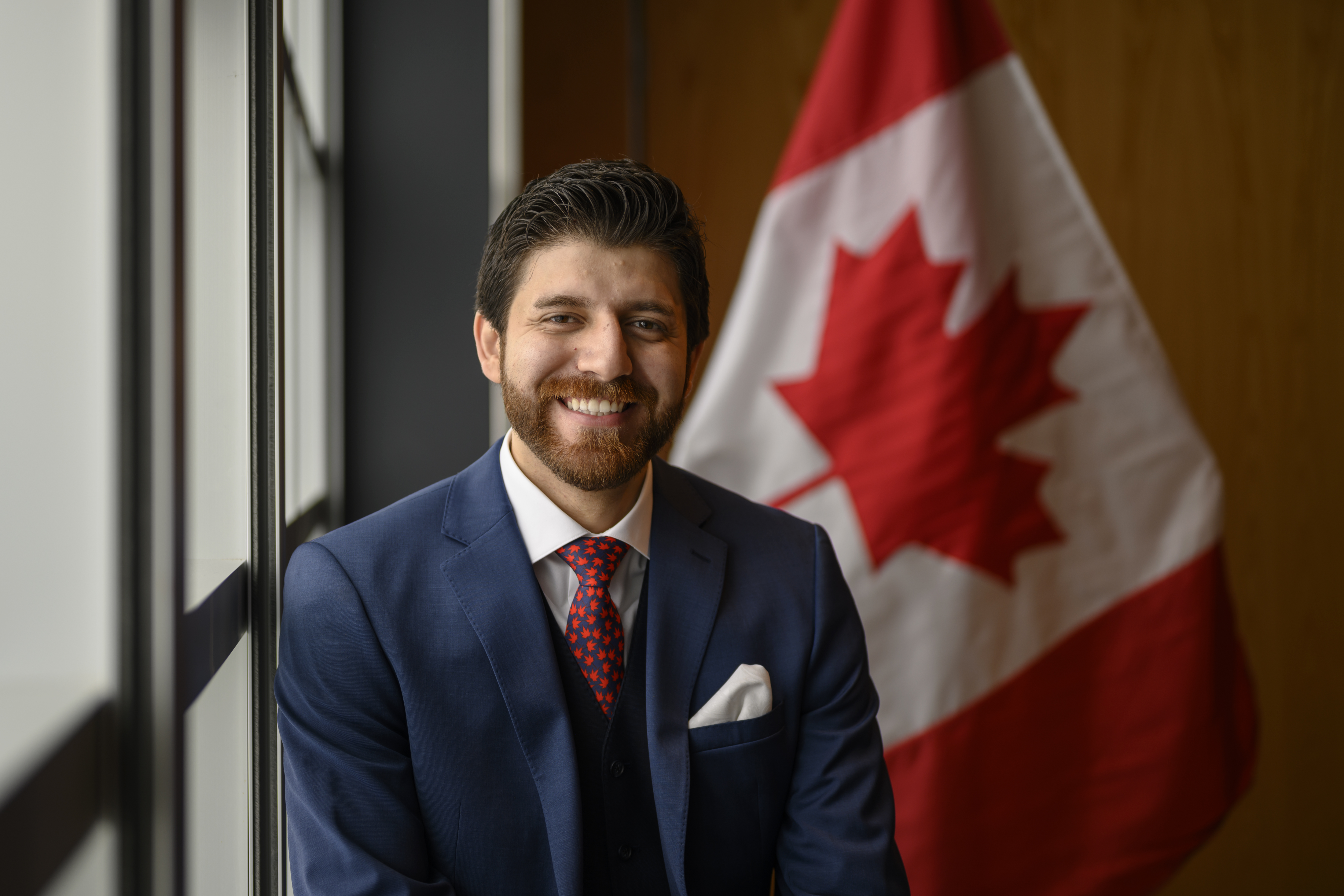 Tareq Hadhad, a Syrian refugee and founder of Peace by Chocolate, poses prior to his Canadian citizenship ceremony at Pier 21 in Halifax, Nova Scotia