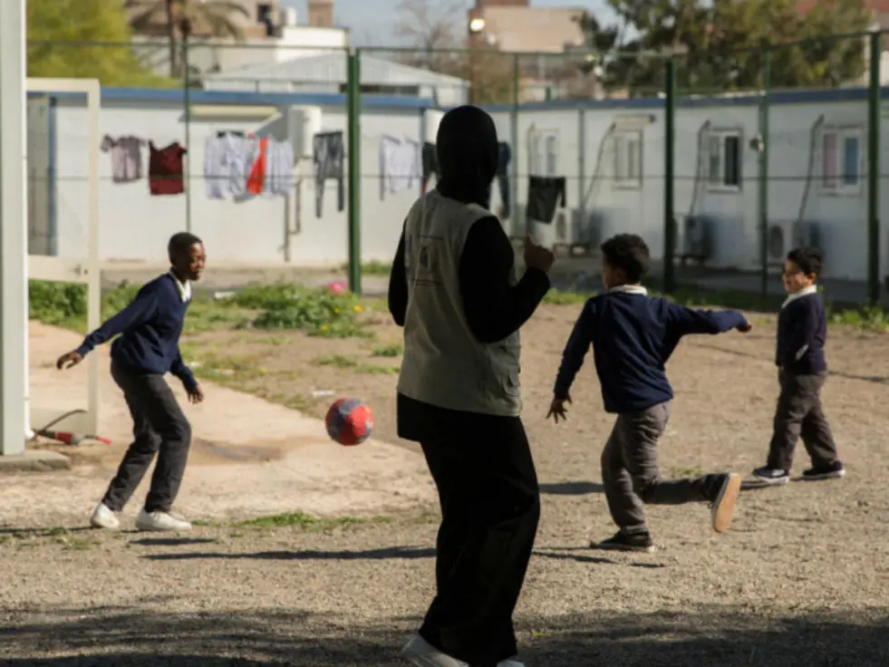refugees play soccer in Libya