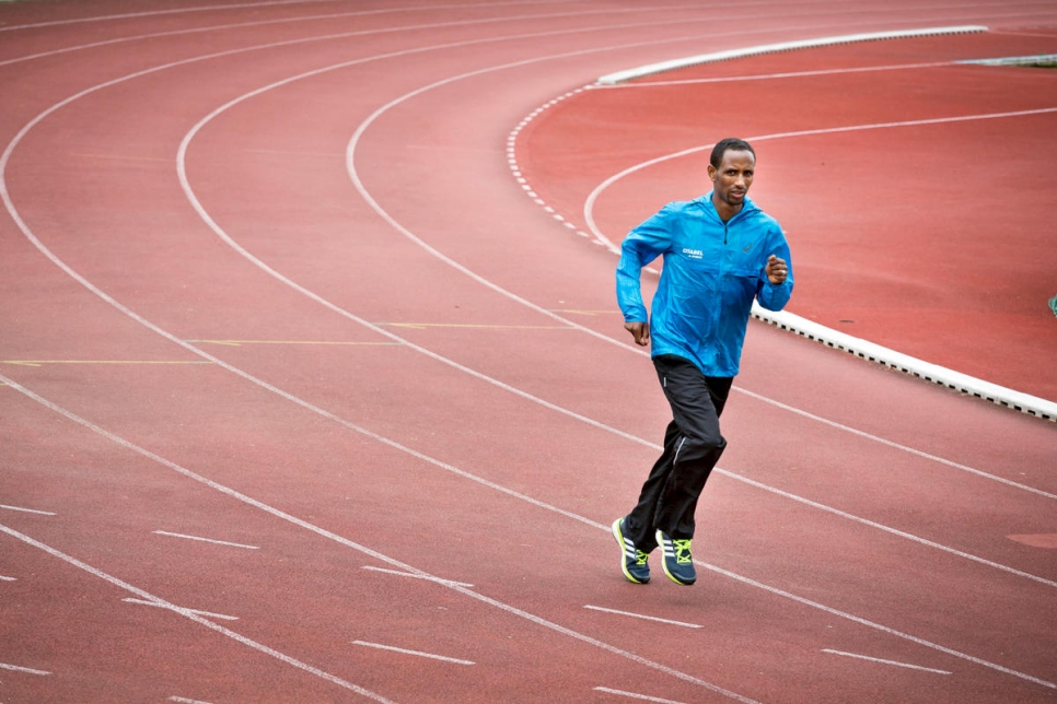 A runner (athlete) trains on a track for the 2020 Tokyo Marathon