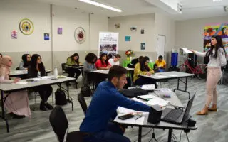 Group of people sitting in a class